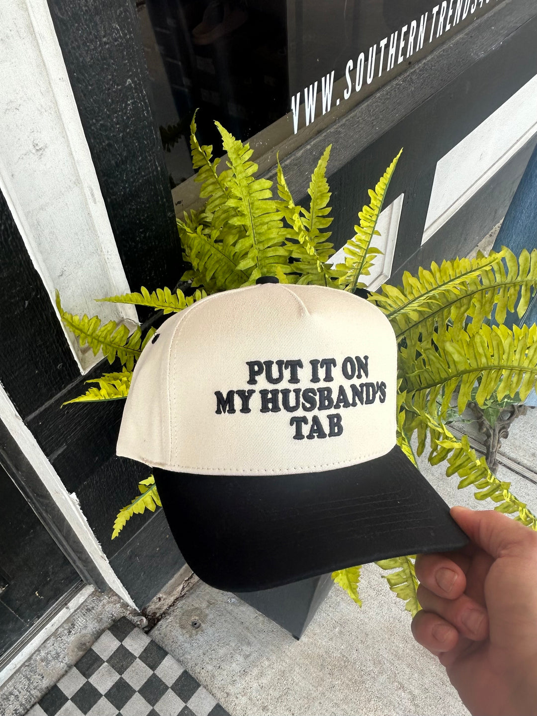 Put It On My Husbands Tab Trucker Hat